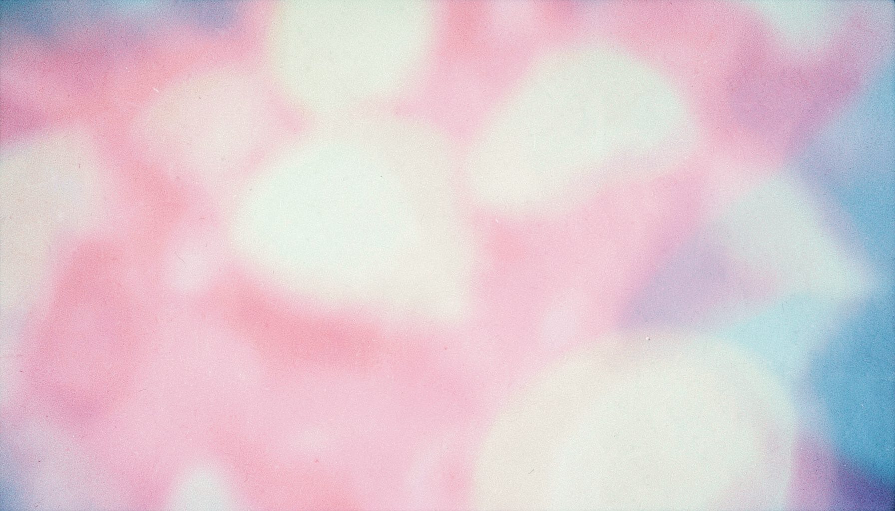 Soft pastel pink and cream abstract texture with gentle blurred shapes, evoking a calm and supportive atmosphere.